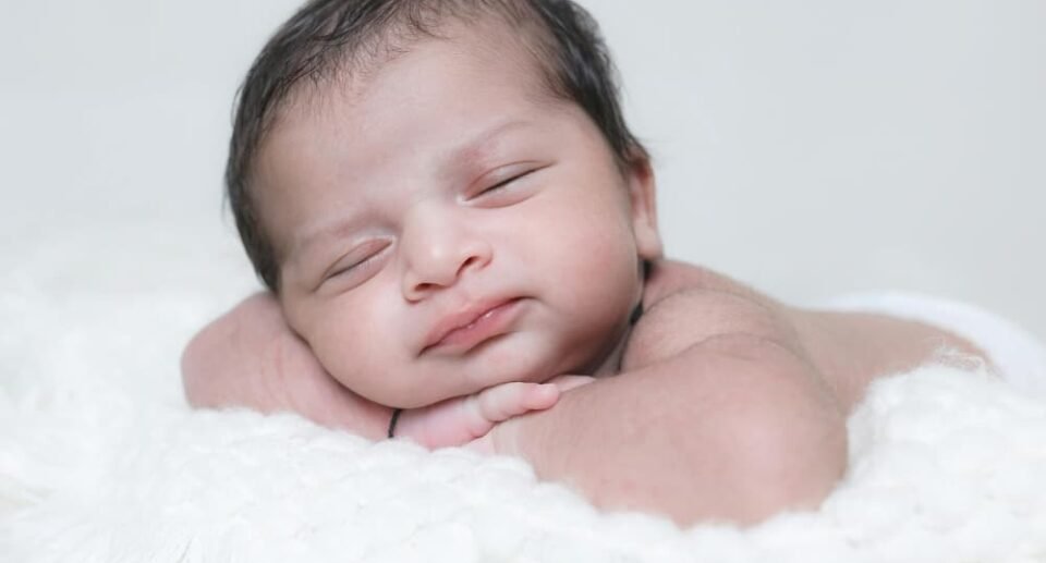Why Do Babies Smile In Their Sleep