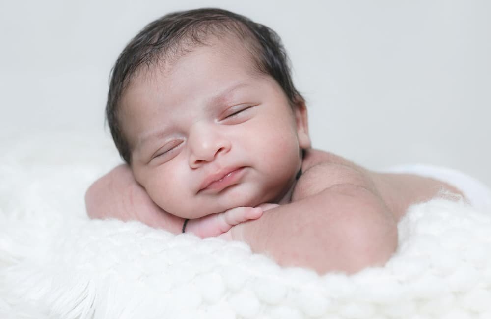 Why Do Babies Smile In Their Sleep?